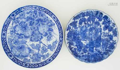 Two Japanese porcelain chargers, late Meiji/Taisho period, comprising a dished example painted