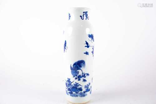 A Chinese blue and white vase, painted with two cockerels, butterflies and insects by rockwork and