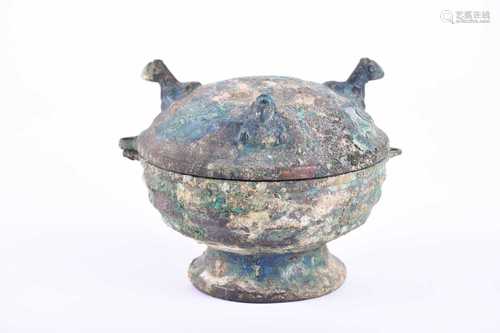 A Chinese bronze double lamp, Spring & Autumn period (771 - 476 BCE), the top with three