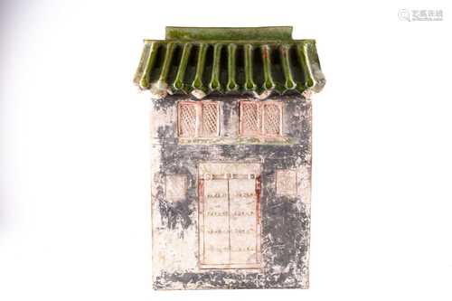 An imposing Chinese pottery town house, early Ming, the main body with a pair of double upper