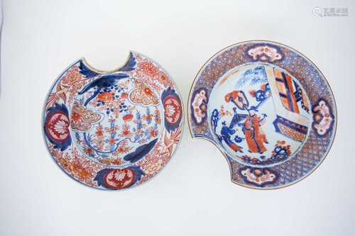 Two Japanese Arita porcelain barbers bowls, 17th century, depicting a dignitary with an attendant