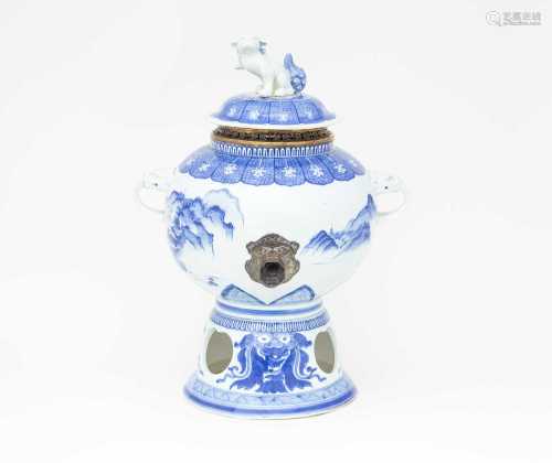 A Japanese Hirado blue & white cistern, 19th century, the domed cover with dog of Fo finial, the