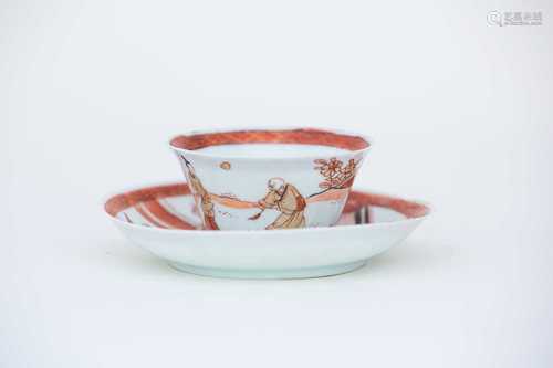 A rare Chinese eggshell tea bowl and saucer, circa 1690, painted in iron red, gilding and black,