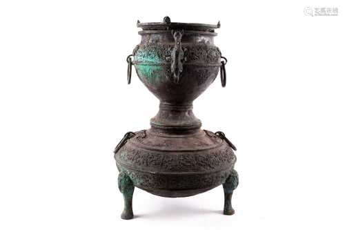 A Chinese bronze Xian, Han Dynasty, the upper section with a fixed dished plate, the interior of