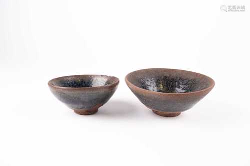 Two Chinese Jian ware bowls, possibly Northern Song and later, each with hares fur glaze, on an