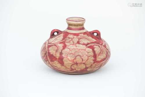 A Chinese pottery vase, of compressed form, painted with red peony flowers, with two small loop