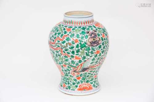 A Chinese famille verte vase, Kangxi, early 18th century, of inverted baluster form, painted with