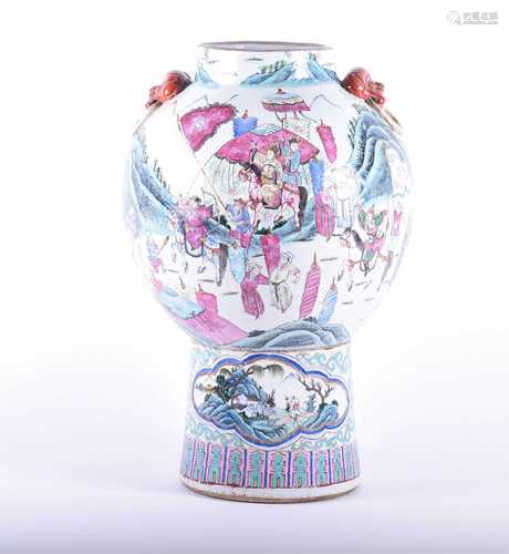 A Chinese Famille Rose vase, mid 19th century, the shoulders with lion mask handles, the spherical