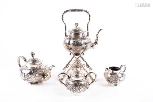 A Chinese four piece silver tea set by Yok Sang, 19th century, comprising spirit kettle, teapot,