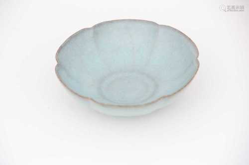 A Chinese lotus - petalled bowl, 20th century after a Ru original, the blueish grey glaze with small