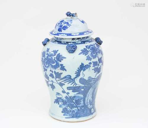 A Chinese blue and white baluster vase and associated cover, Qing, the cover with shishi knop,