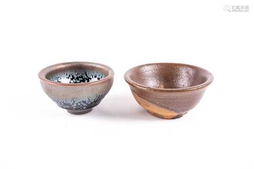 A Chinese Song style oil spot bowl, 20th century, the glaze falling short of the circular foot,