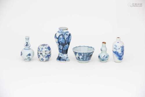 Blue and white Chinese miniatures, 18th century, including two double gourd vases, a fluted tea