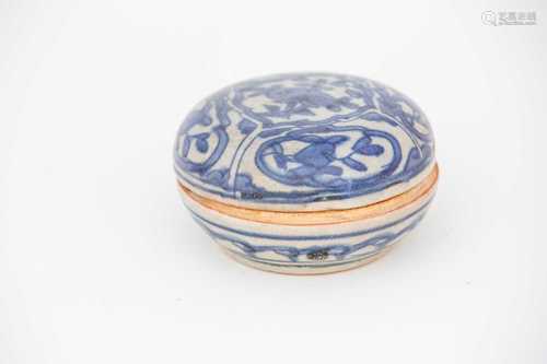 A Chinese blue and white circular box and cover, late Ming dynasty, the cover painted with panels of