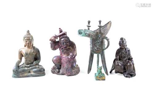 Three Chinese bronzes, comprising a late Ming period seated figure of Guanyin; a late Qing well cast