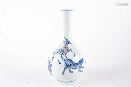 A Chinese mythical creatures vase, painted in underglaze blue and iron red, pseudo six character