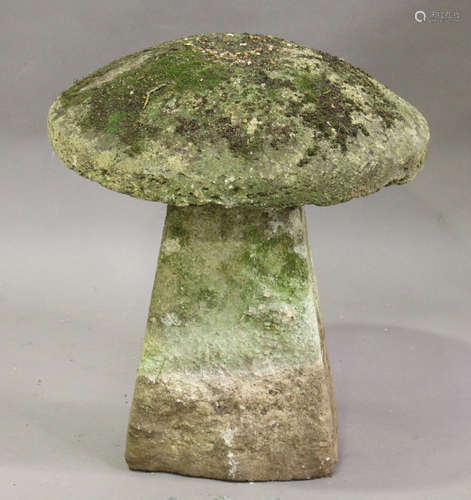 A 19th century carved staddle stone of typical mushroom form, height 67cm, diameter 57cm.Buyer’s