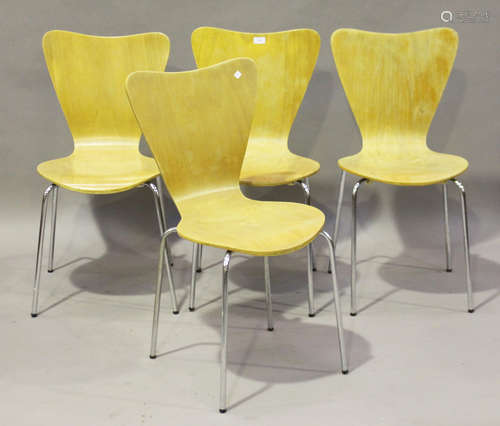 A set of four modern beech-faced ply and chromium plated tubular metal 'ant' chairs, after a