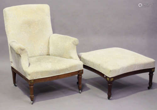 An early/mid-20th century French walnut framed reclining armchair with gilt metal mounts and