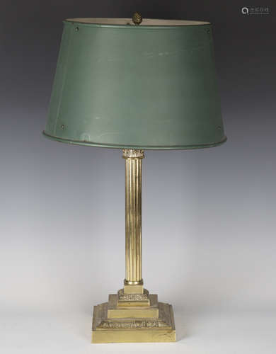 A 20th century brass Corinthian column table lamp base with a tole painted metal shade, height