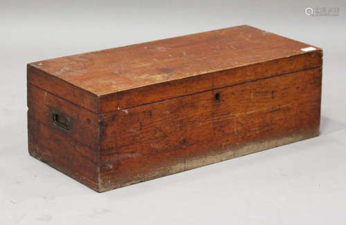 A late Victorian teak trunk with brass recessed handles, the baize-lined interior fitted with a