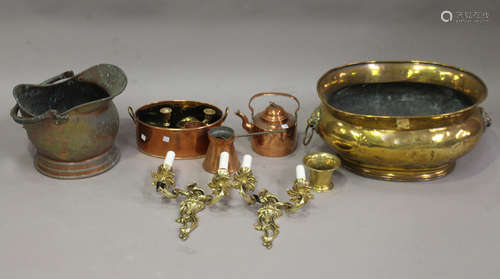 A collection of copper and brassware, including a 19th century Dutch brass jardinière, width 51cm, a