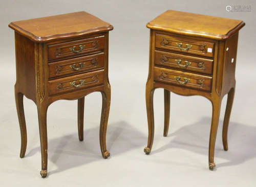 A pair of late 20th century French stained beech bedside chests of three drawers, height 68cm, width