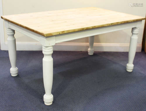 A late 20th century white painted and stripped pine rectangular kitchen table, height 77cm, length