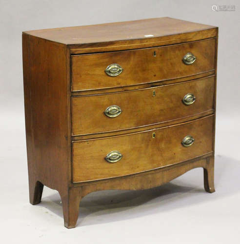 A George IV mahogany bowfront chest of three drawers, height 86cm, width 88cm, depth 46cm (some