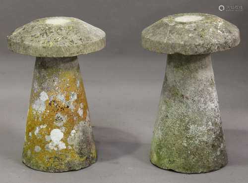 A pair of late 19th/early 20th century carved staddle stones of typical mushroom form, height