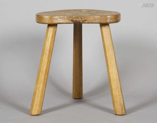 A Robert 'Mouseman' Thompson oak stool, the kidney-shaped seat with typical carved mouse