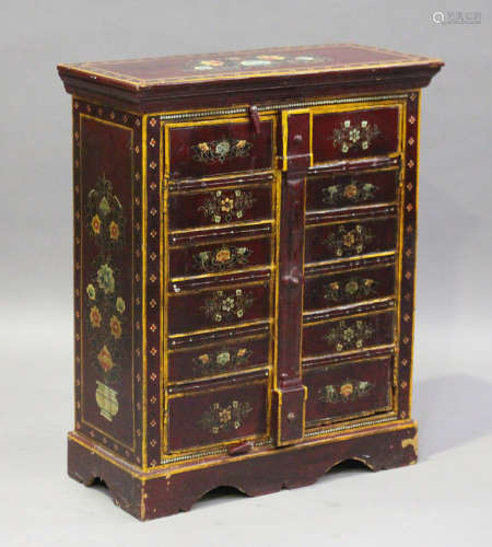 A 20th century Eastern floral painted cupboard, fitted with a pair of metal-bound doors, height