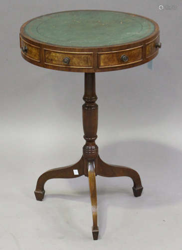 A 20th century Regency style mahogany and pollard oak revolving drum-top wine table, the leather