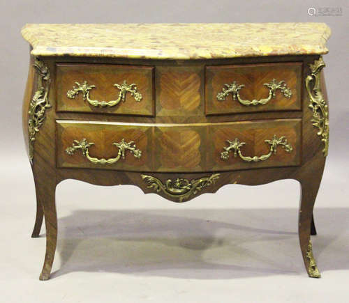 A 20th century Louis XV style kingwood and gilt metal mounted three-drawer commode with a serpentine