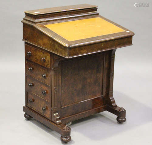 A mid-Victorian burr walnut Davenport by Thomas Turner of Manchester, the hinged writing surface