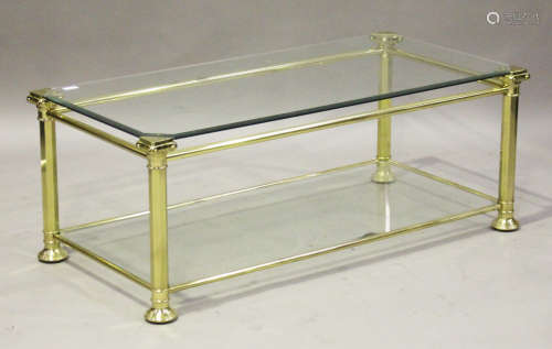A modern gilt brass and glass rectangular coffee table with Ionic column supports, height 46cm,