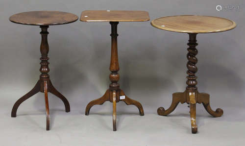 A Regency mahogany rectangular wine table, on a turned baluster column and tripod cabriole legs,