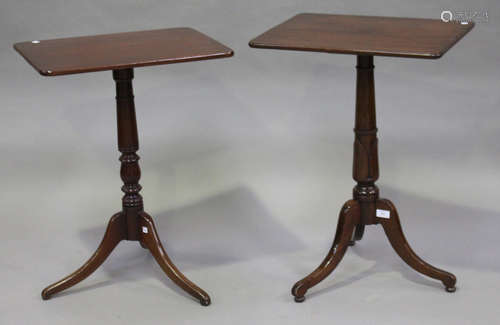 Two similar 19th century mahogany tripod occasional tables, one on a carved flower cusp stem, height