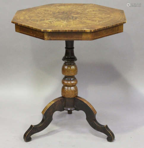A late 19th century Italian Sorrento parquetry veneered octagonal wine table, raised on tripod