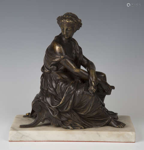 A late 19th century French brown and gilt patinated cast bronze figure of a seated Classical maiden,