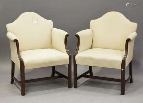 A pair of early 20th century mahogany framed hump back armchairs, on moulded block legs, height