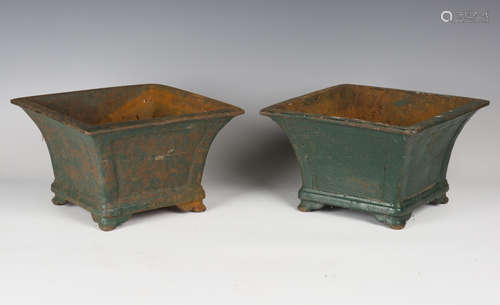 A pair of 20th century green painted cast iron garden urns of waisted square section, height 17cm,