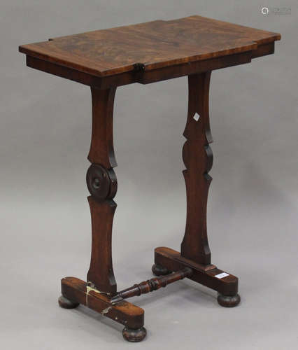 An early Victorian figured mahogany wine table, the shaped rectangular top on shaped twin