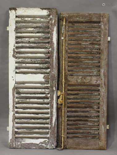 A pair of late 19th/early 20th century white painted oak French louvre shutter doors, each door