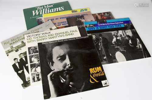 A varied collection of jazz, pop and classical records, including 'Rum and Coca Cola' by Barry