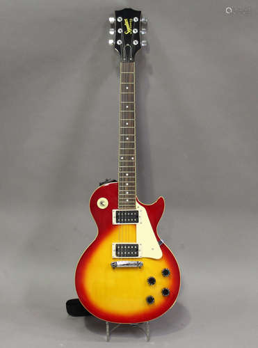 A Gibson Baldwin Signature series six-string electric guitar, together with a Rockbag soft case.