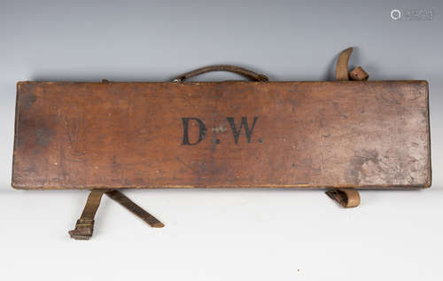 A late 19th/early 20th century brown leather gun case, width 82cm, together with an antler handled