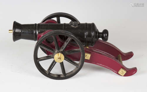 An early 19th century cast iron model of a Russian field artillery cannon, length of barrel 25.