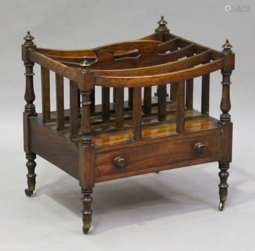 A Regency mahogany Canterbury, the four divisions with central pierced handle above a mahogany-lined