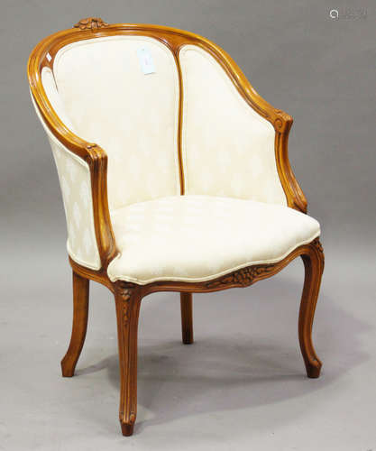 A modern Louis XV style showframe tub back chair, upholstered in patterned cream damask, height